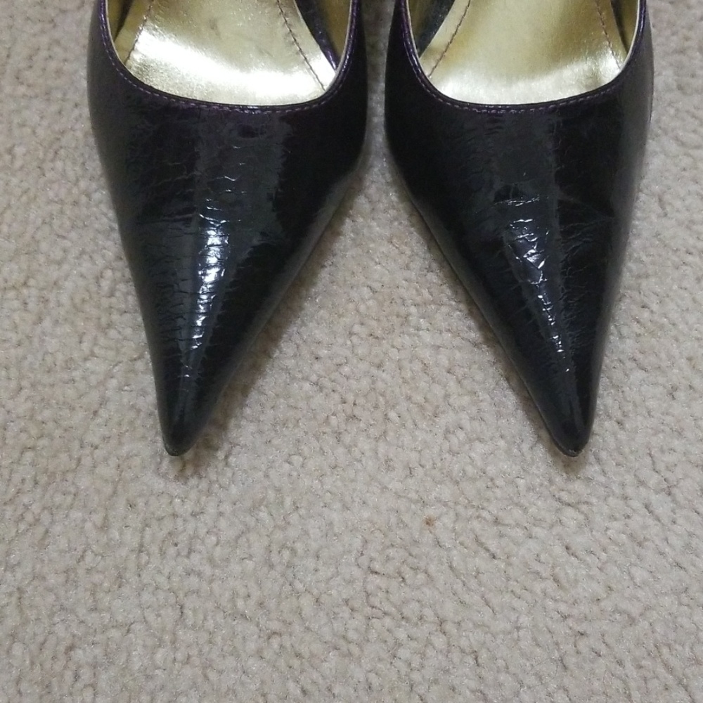 Dark purple pumps